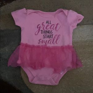 Onesie with stitched on skirt